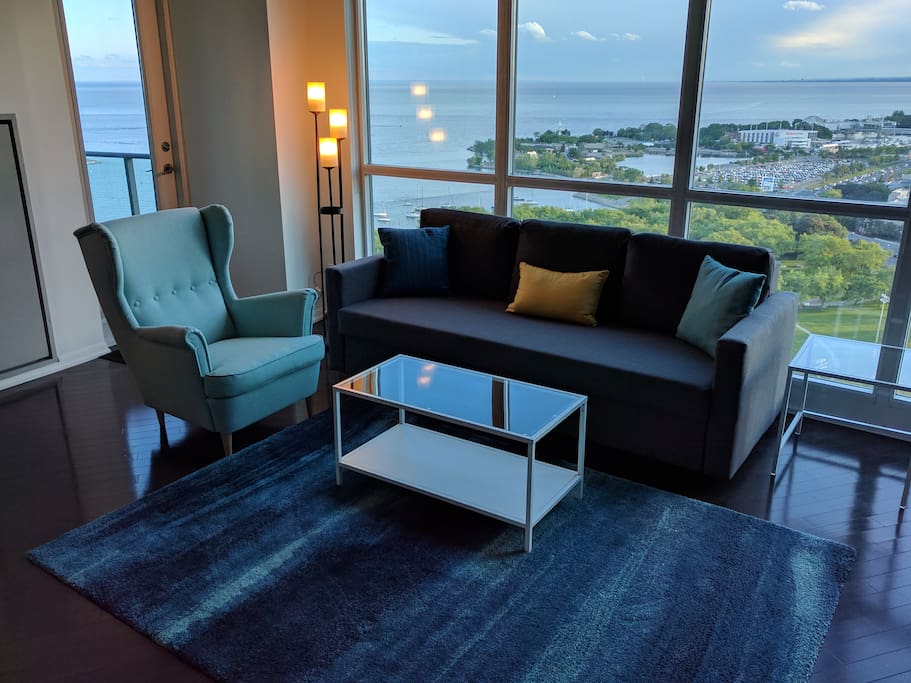 Evening picture: Stunning view overlooks the Waterfront, Ontario Place, CNE, and 33 acre Coronation Park. Oak hardwood flooring throughout most of this stunning ~1100sqt suite!
