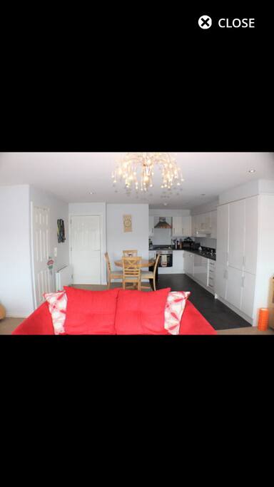Full open planned living area with kitchen and seating area