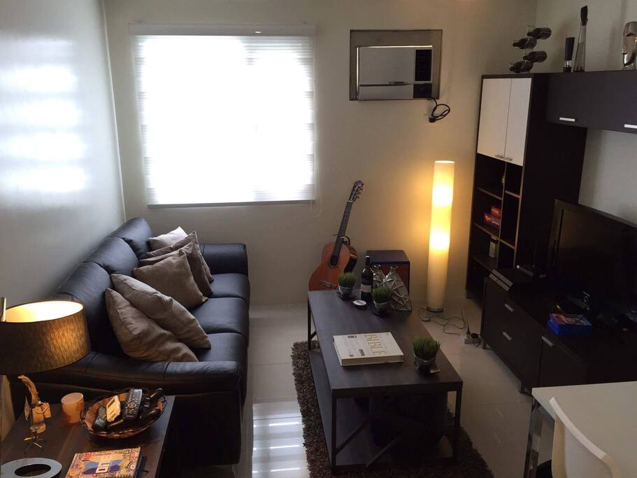 Leather couch with 32" LED TV