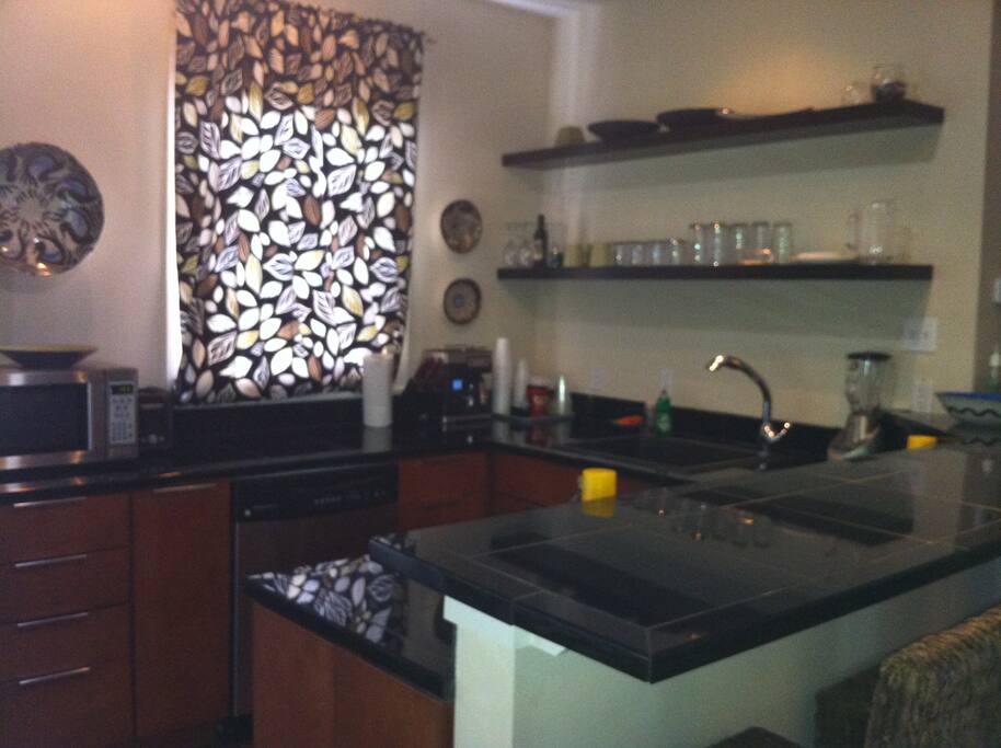 Kitchen with seating for 4 at bar