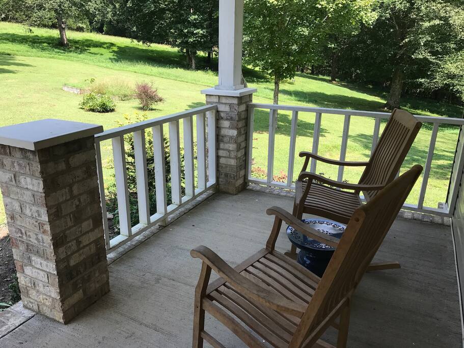 Covered front porch, perfect for relaxing.