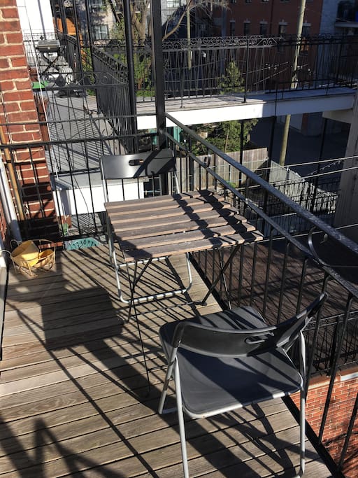 Back balcony - off the kitchen. Sunny in the afternoon until dusk! Perfect for dinner and evening drinks!