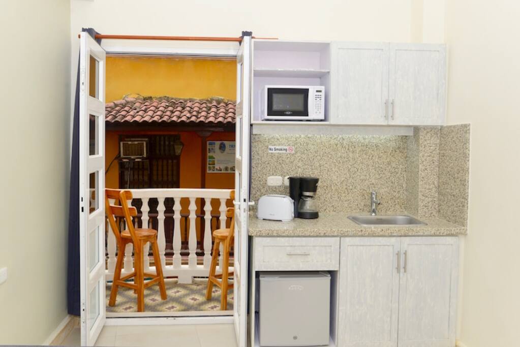 Comes with two kitchenettes, this one in the living room & the other in the interior bedroom