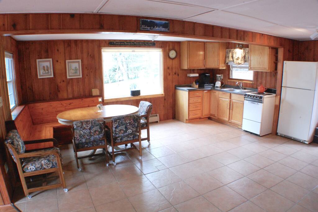 Convenient built-in seating opens up to kitchen.