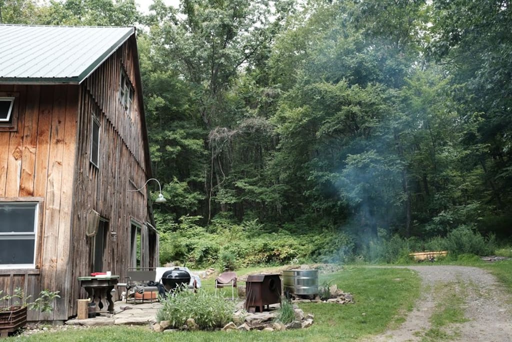 Outdoor patio, grill, hot tub, and fireplace