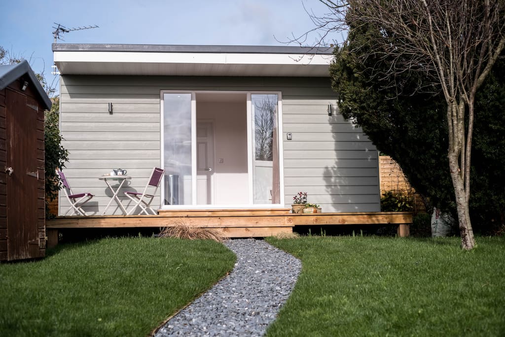 The lodge is tucked away at the top of the garden