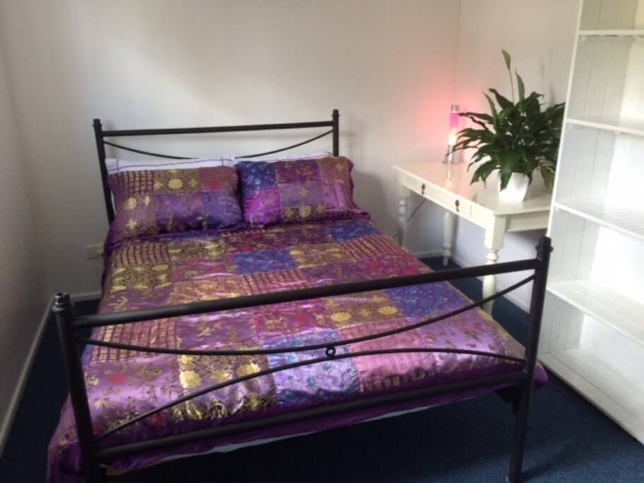 Air-conditioned bedroom with window.