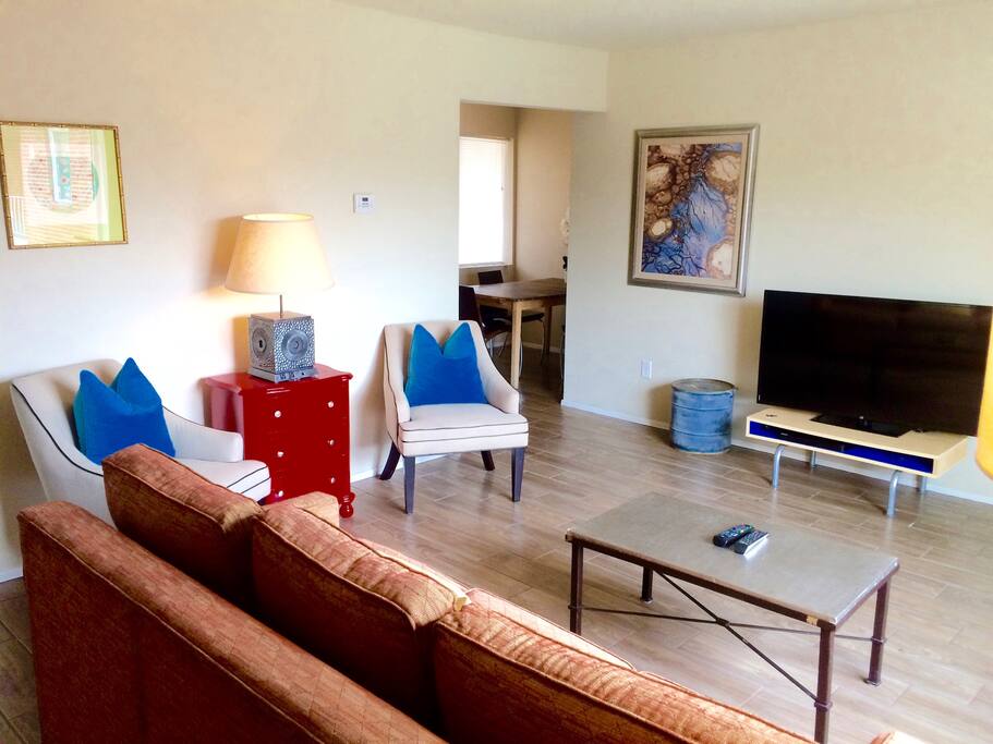 Living room complete with sleeper sofa & large flat screen TV