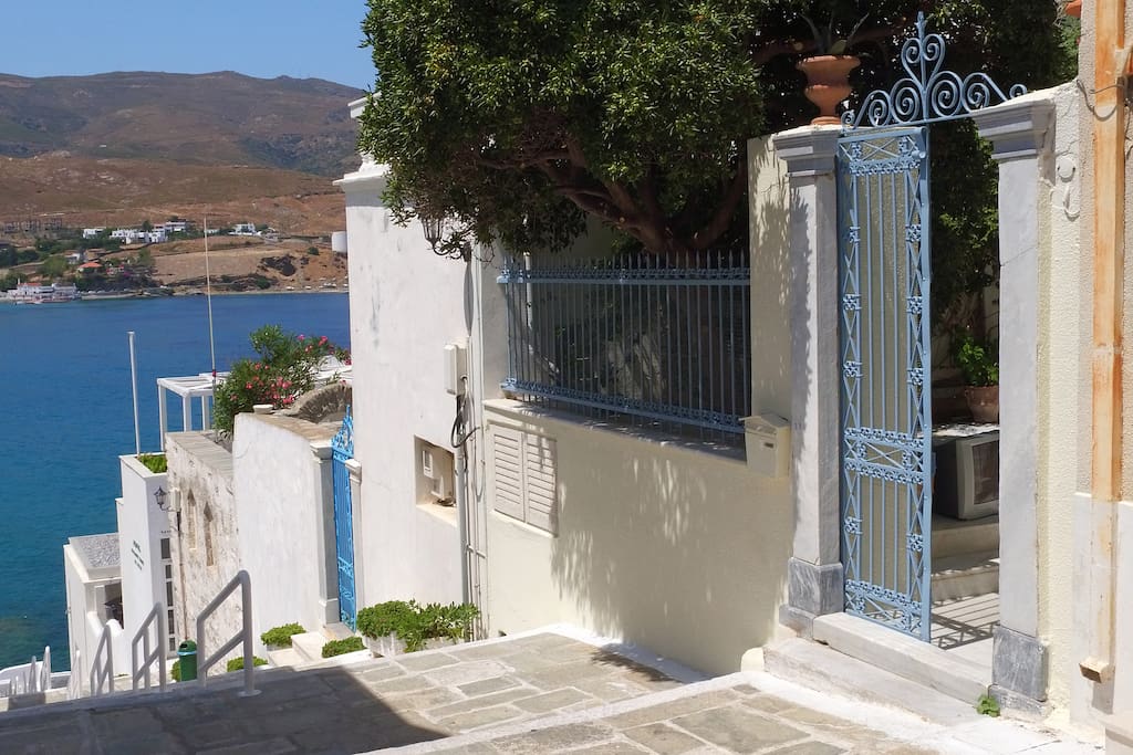 Front entrance with view of Niborio beach. The museum of Modern Art is further down the steps