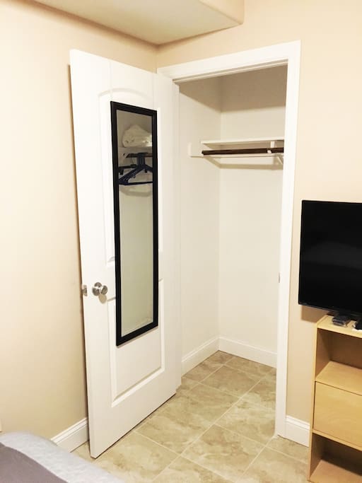Deep closet with mirror