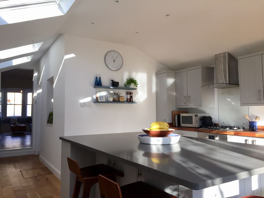Kitchen - with a separate utility room with washing machine and tumble dryer