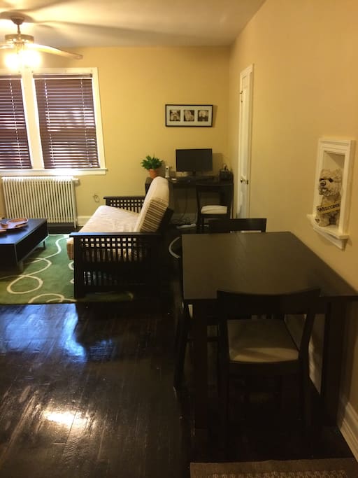 Livingroom, large TV with cable, computer with wireless internet and printer, and full size foldout futon.