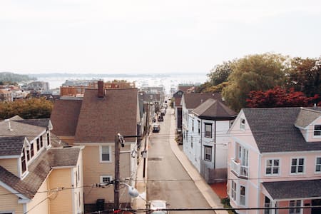Downtown roofdeck unit with offstreet parking