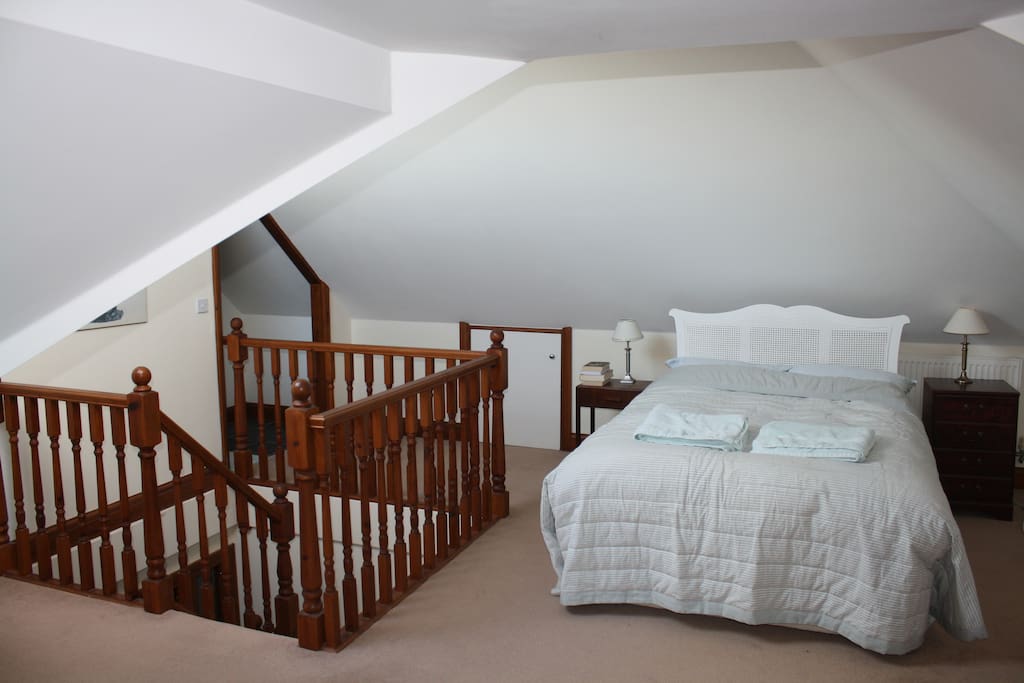The bedroom is open plan to the stairs but there is a door at the bottom to keep your space private.