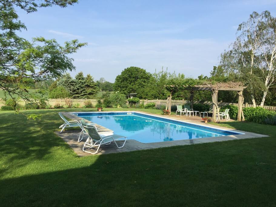 Lounge by the pool or relax under the shady pergola