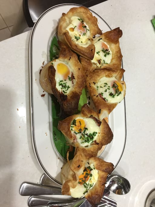 A sample of "Breakfast Pots" made with puff pastry, ham, sour cream and an egg.