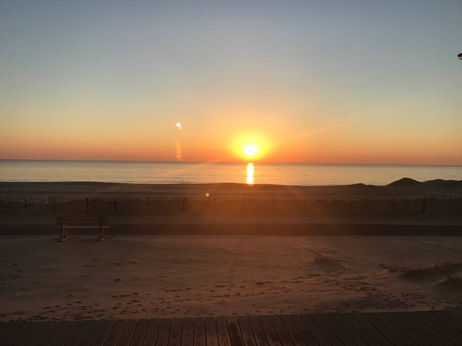 Beautiful sunrises over the ocean steps from your newly remodeled beach oasis
