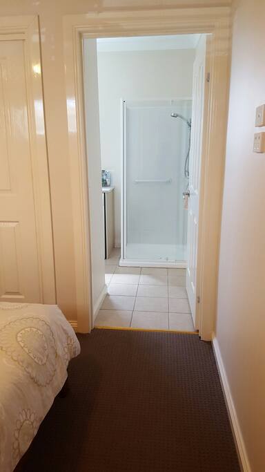 The ensuite is accessible from the main bedroom