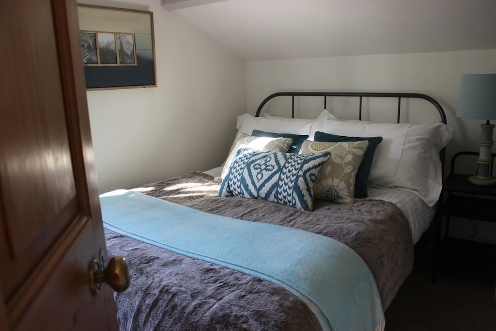 Bedrooms are fresh and modern with crisp white sheets.