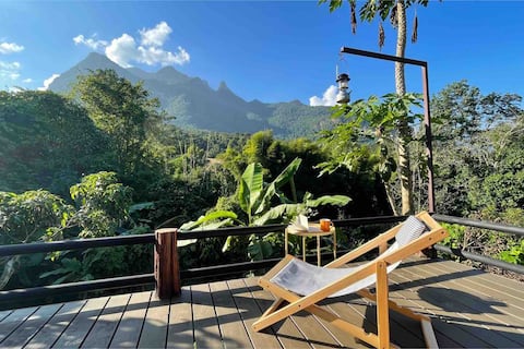 Fibre Internet - Wooden house at foot of Mountain