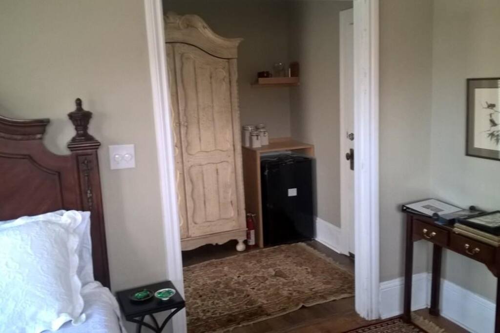 Private entrance with armoire, mini refrigerator and coffee maker.