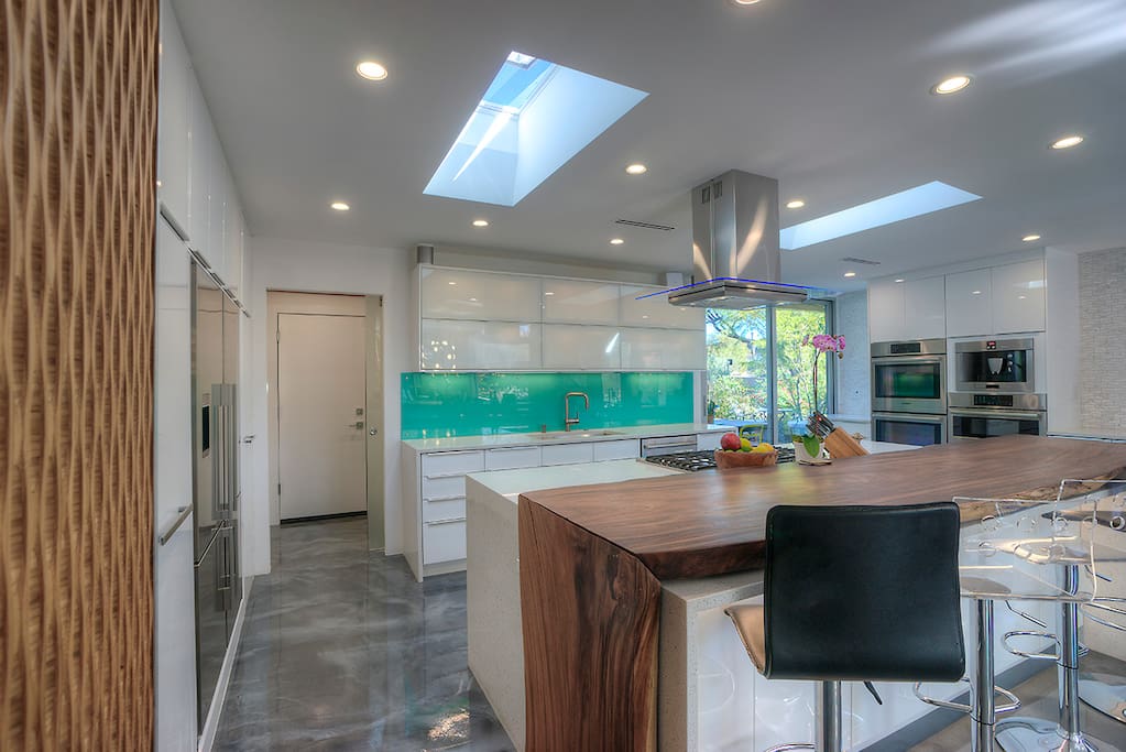 The gourmet kitchen is spacious and luxurious space for meal preparation and entertainment entering