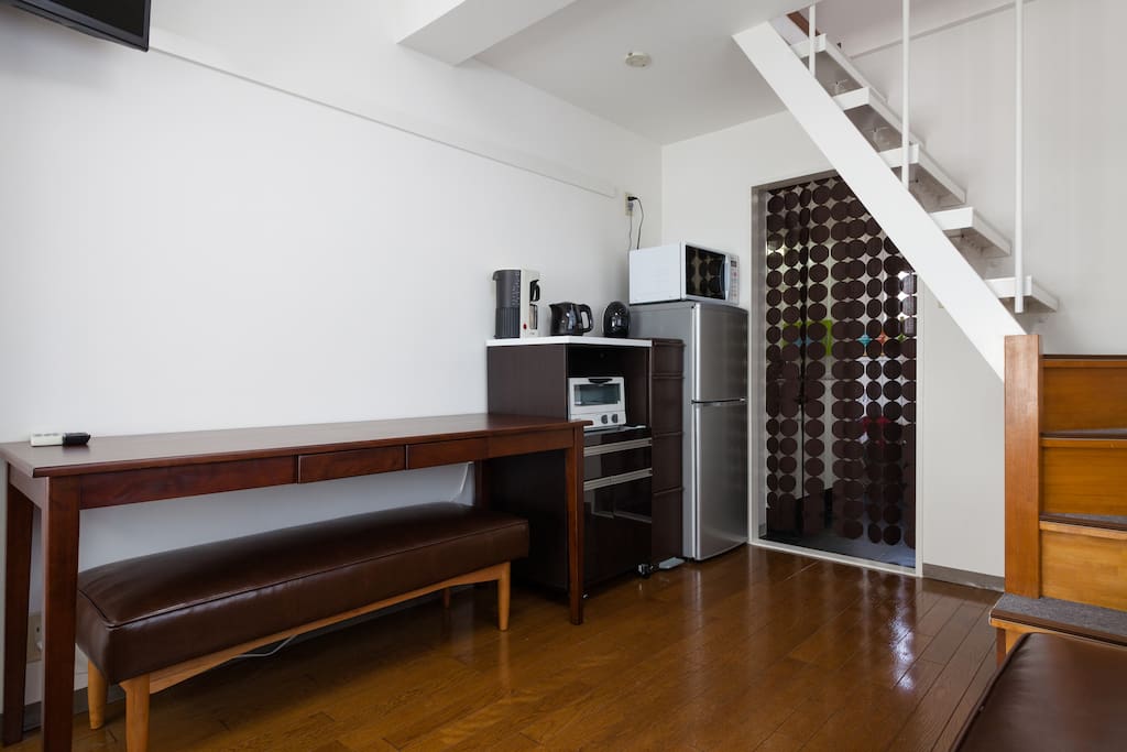 There are dining area and two single beds downstairs and another two single beds upstairs.