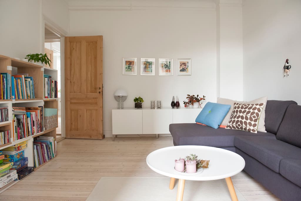 This room is facing the courtyard where you will find a large balcony. The sofa is a sofabed and sleeps 2 people