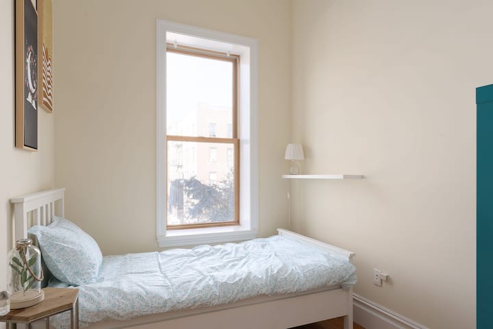 Cozy bedroom with comfy cotton bedding. 