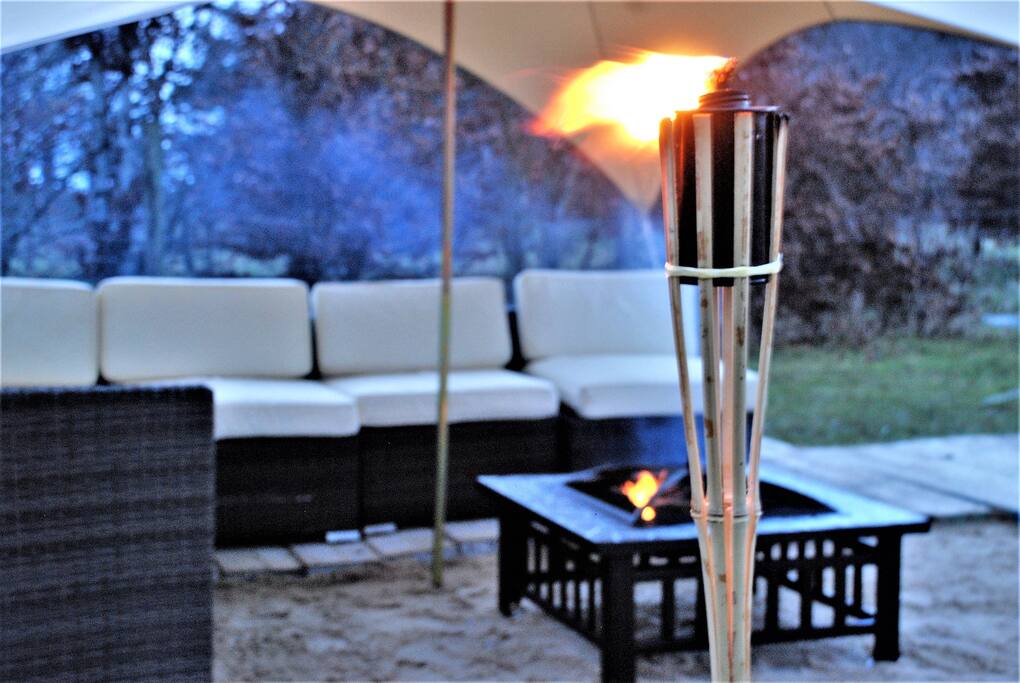 Contemporary Fire Pit and Private Deck IMAGE For Show Purposes , actual deck will be raised and Fire Pit and Seating will be placed in a sunken area within the main deck with wooden steps leading down to a bed of white sand. The experience this cosy hub this will create allows you to dine and commune am fresco with your loved ones while sheltered and warm by your glowing contemporary fire pit.