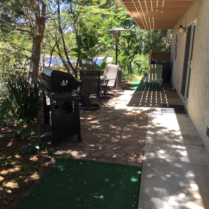 Enjoy sitting on patio, barbequeing or taking swim at pool next door