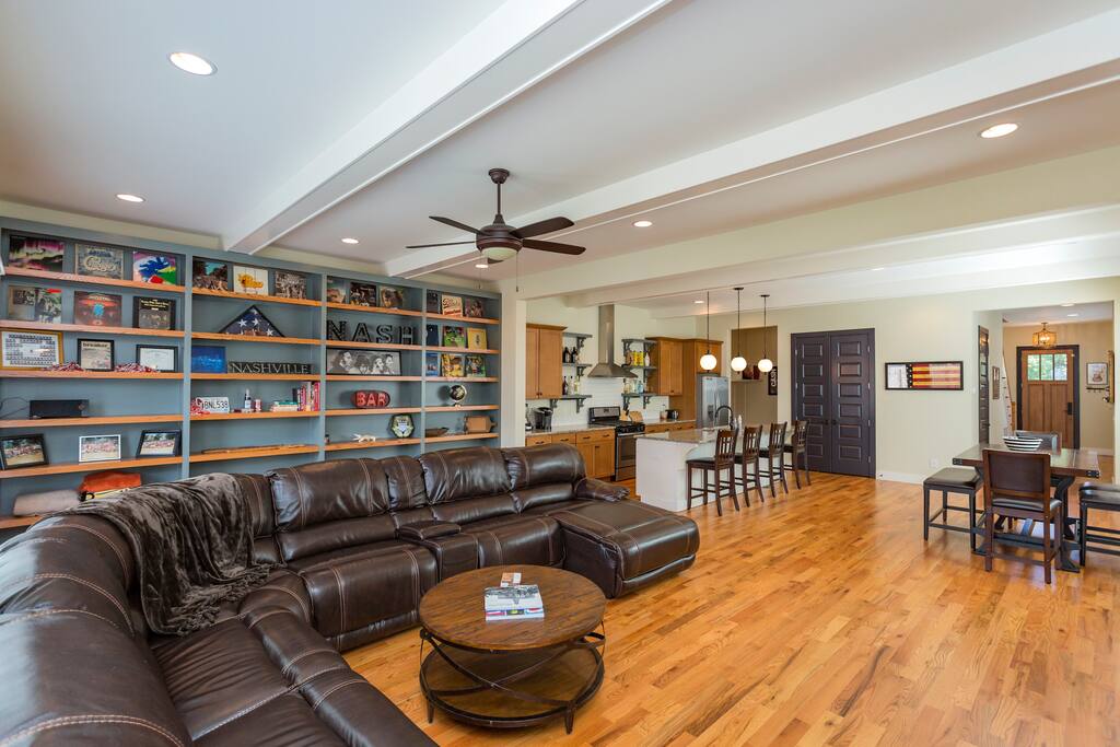 Open floor plan Kitchen and Huge leather sectional with chase lounge