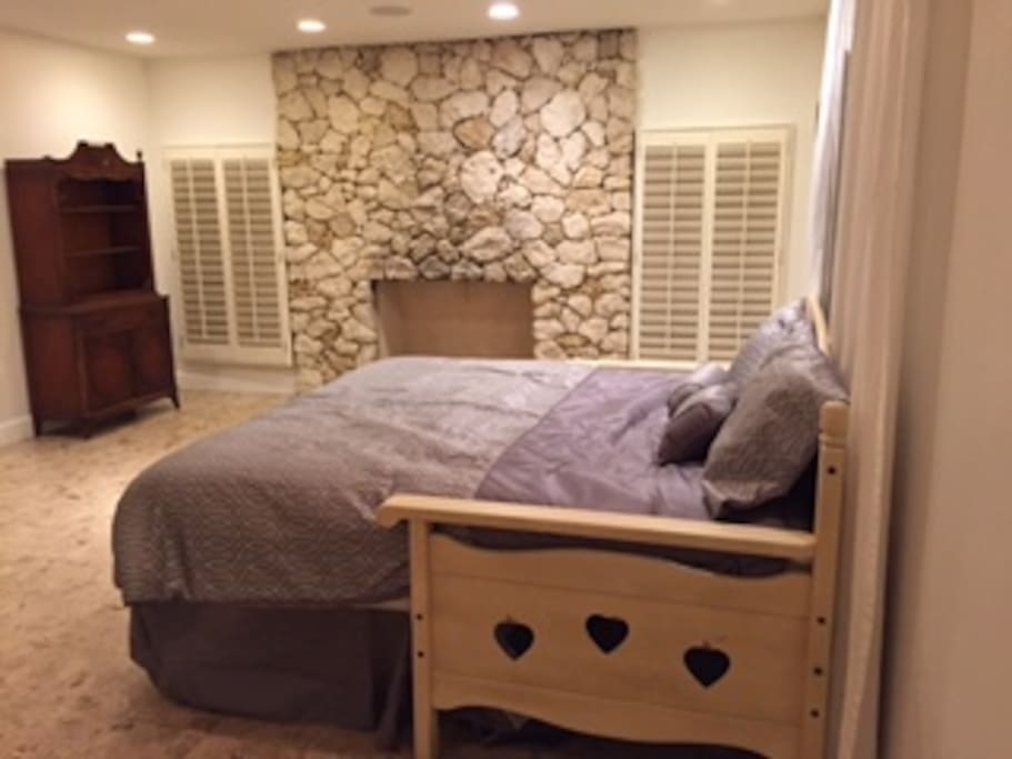 Bedroom with fireplace