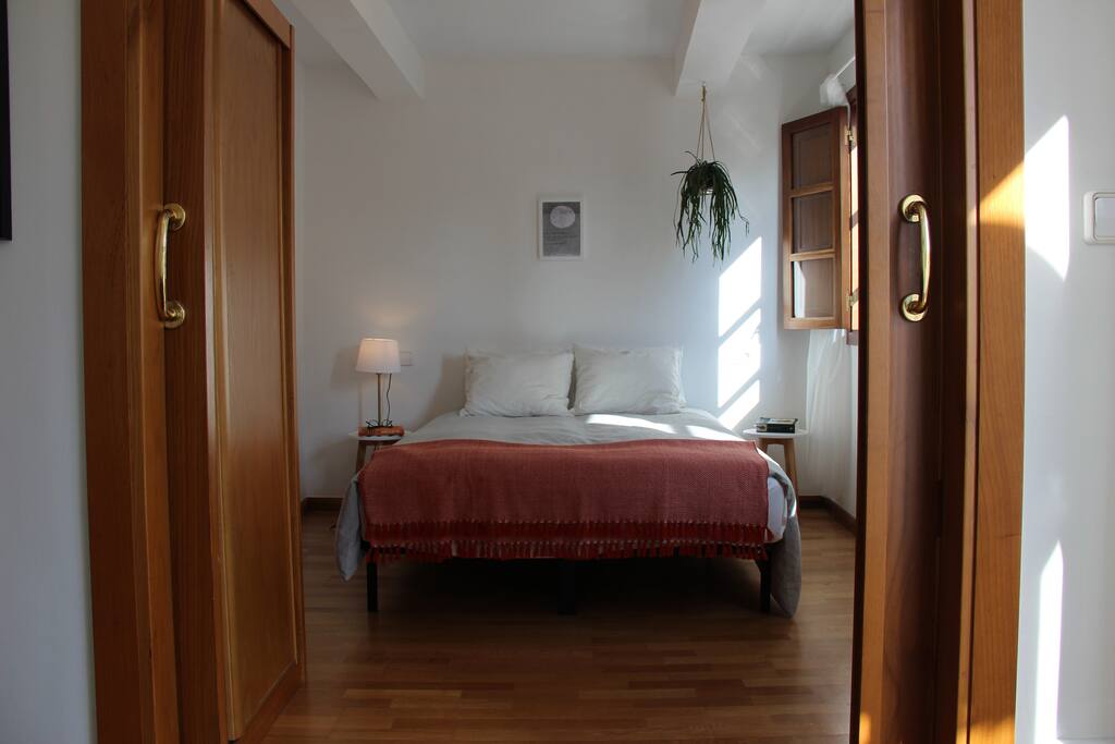 Bedroom with sliding doors.
