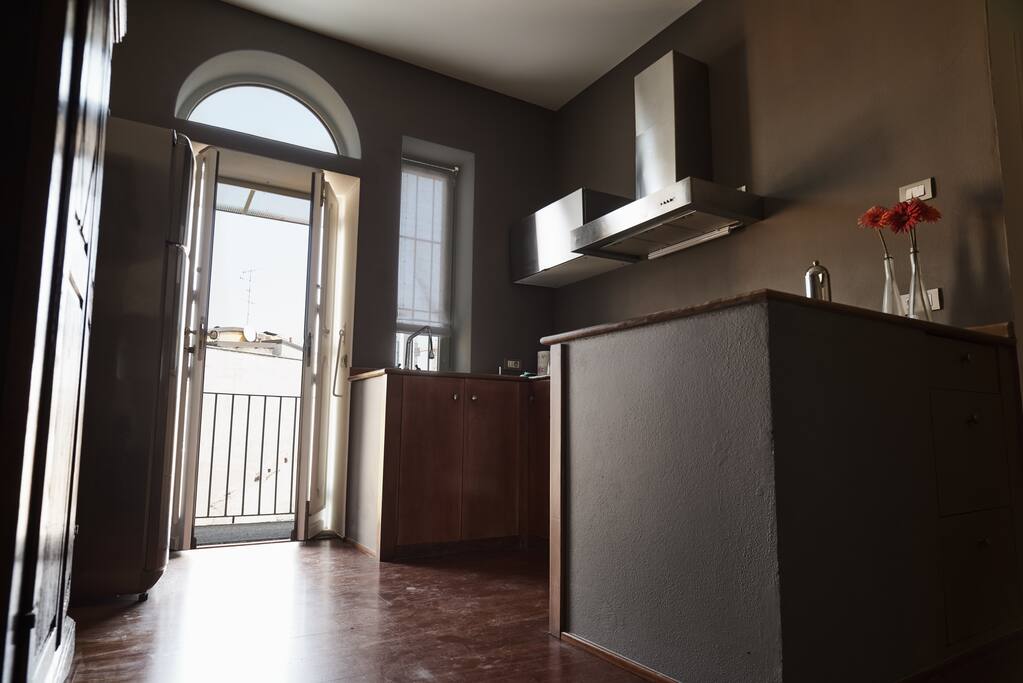One of the two entrances and the kitchen area
