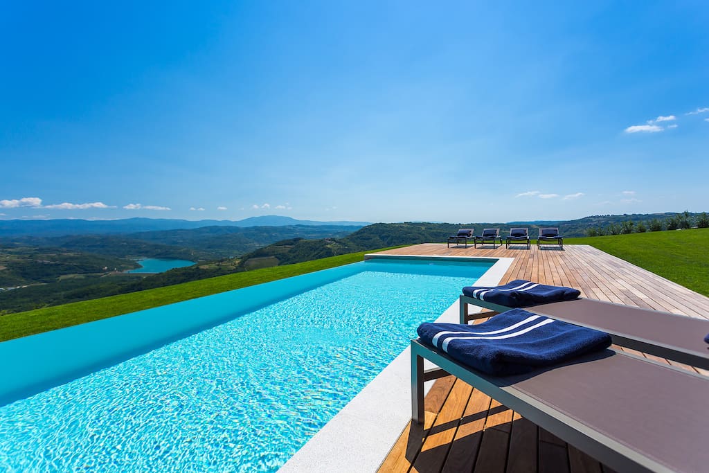 swimming pool with the view of the lake