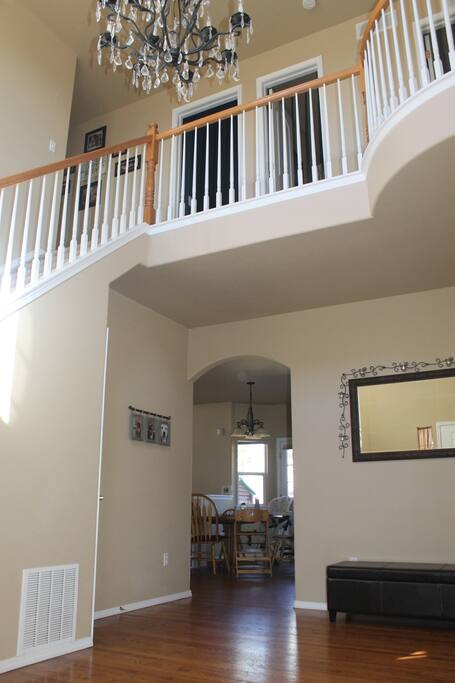 Grand front entry with vaulted ceiling.