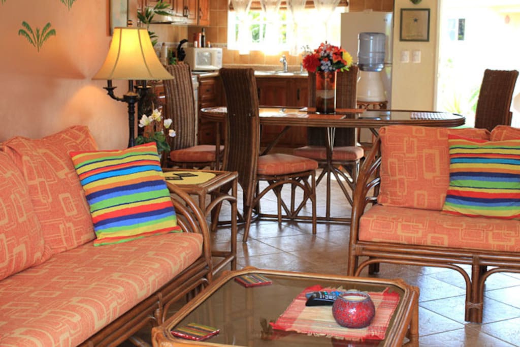 Living room with TV and dining area