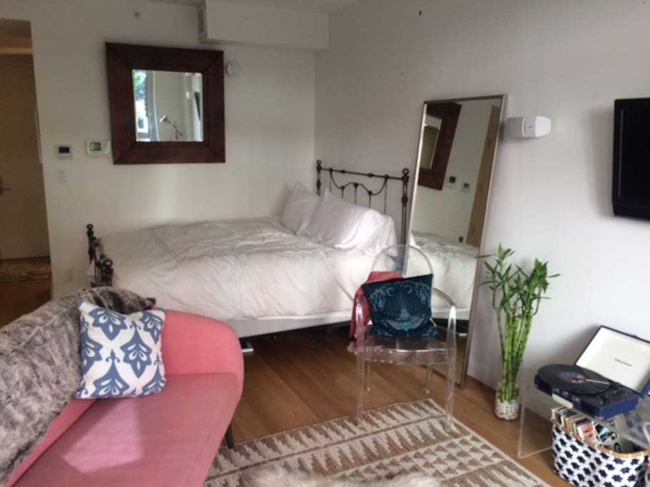 Very comfortable queen bed and small record player available for your use.
