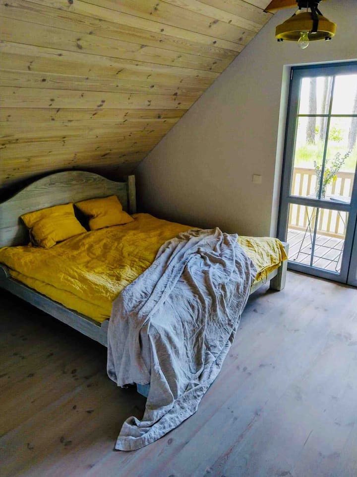 Slaapkamer met balkon