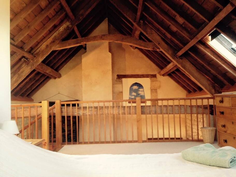 Vaulted wooden-beamed ceilings throughout