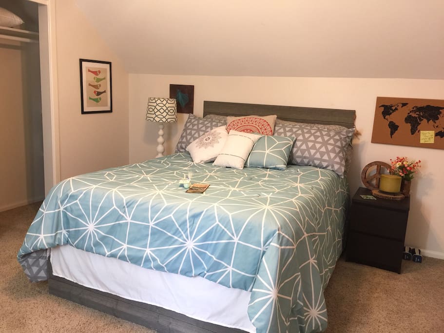 Queen sized bed with storage drawers under the bed. Also features a large closet and desk.