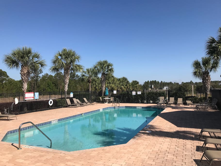 Gated large pool. showers, sunbathing chairs, umbrellas, washrooms, recreational area with basketball court, playground... guests have full access to everything.