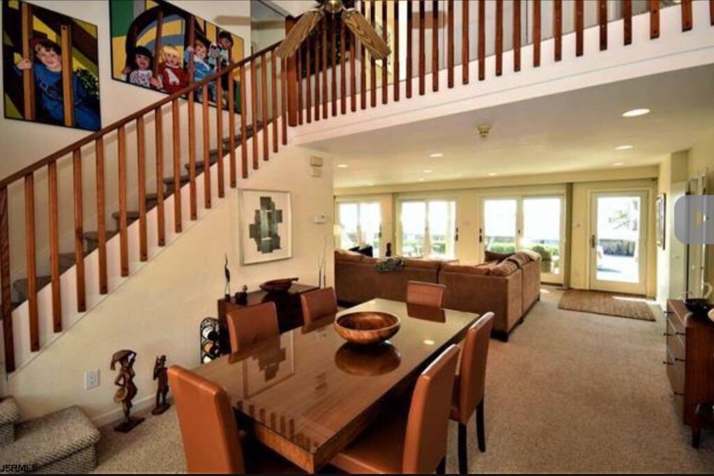First Floor - Open Floor Plan: Kitchen, Breakfast Bar, Dining Room, Living Room and Sitting Room with direct beach and ocean views.