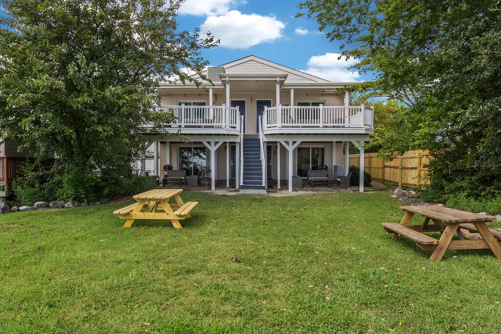 Outdoor common area with 100' dock, picnic tables, firepits and two park grilles