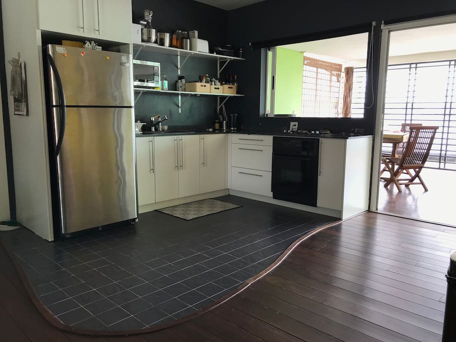 Open kitchen with ample appliances