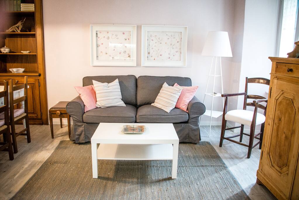 The sofa is a sofa-bed which coverts into an extra bed for 1/2 people