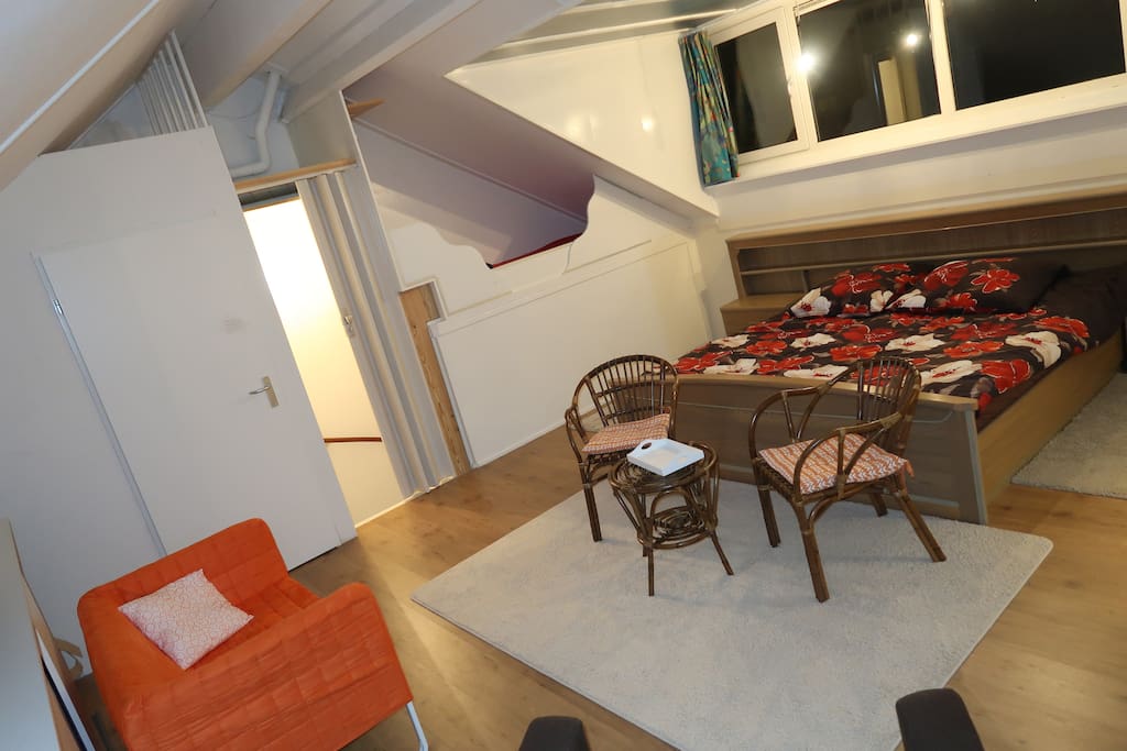 View on sliding door, double-bed and single-bed.