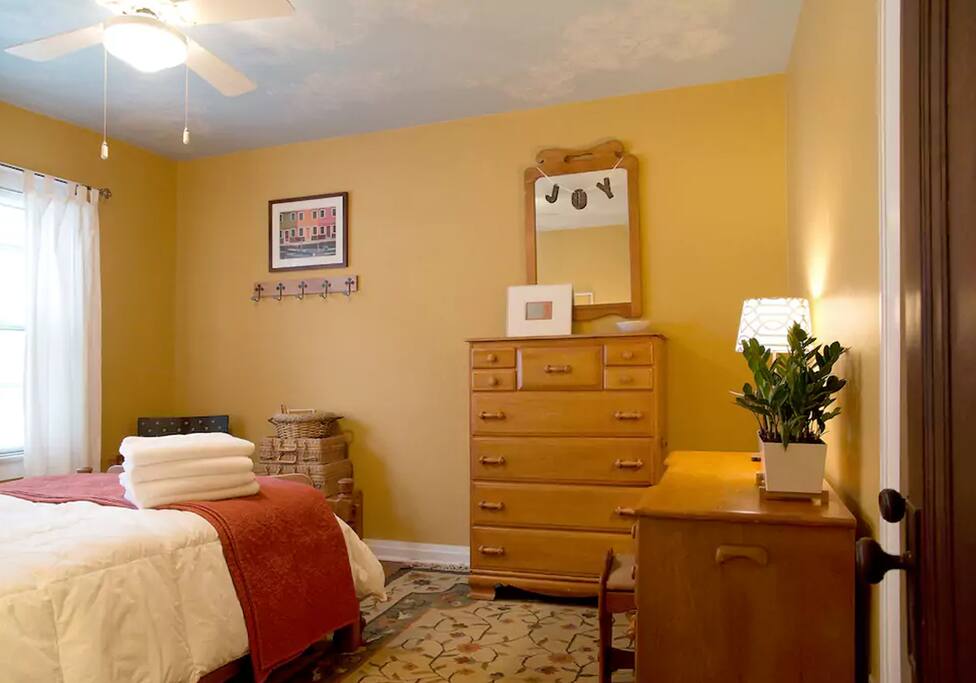 There is plenty of room for your clothes in both the dresser and the closet.