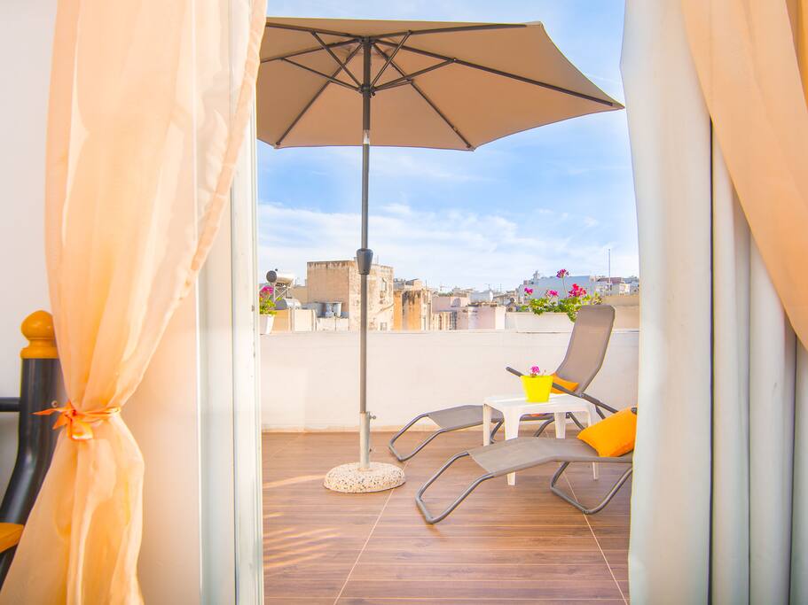 Main bedroom leads onto outdoor terrace